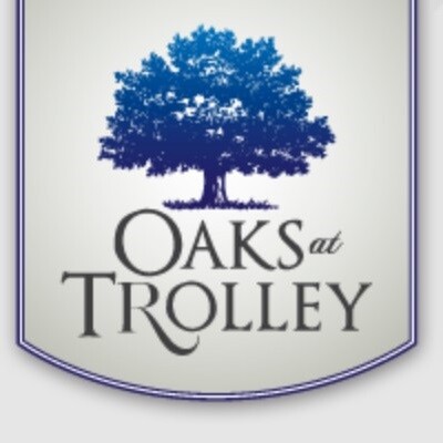 The Oaks @ Trolley Apartments Logo