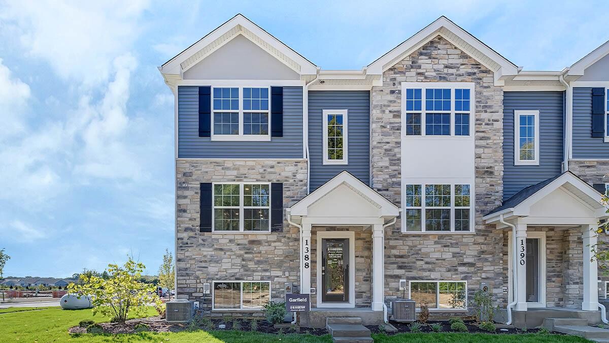 The Grasslands Townhomes by D.R. Horton Logo