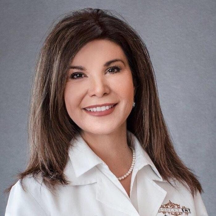 Doucet ENT: Maria M. Doucet, M.D. Logo