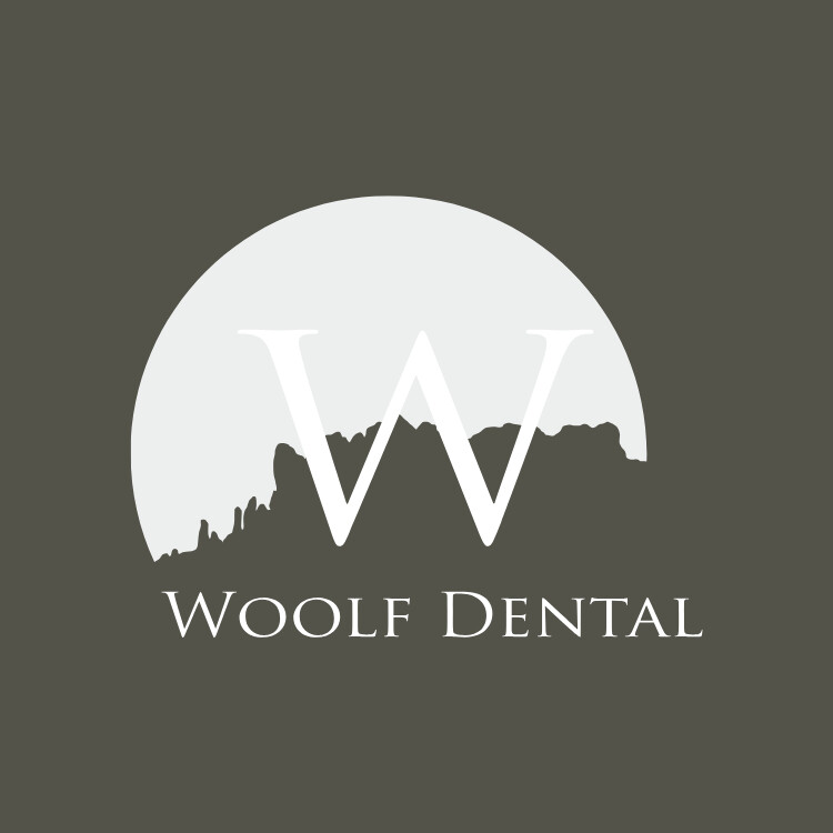 Woolf Dental Logo