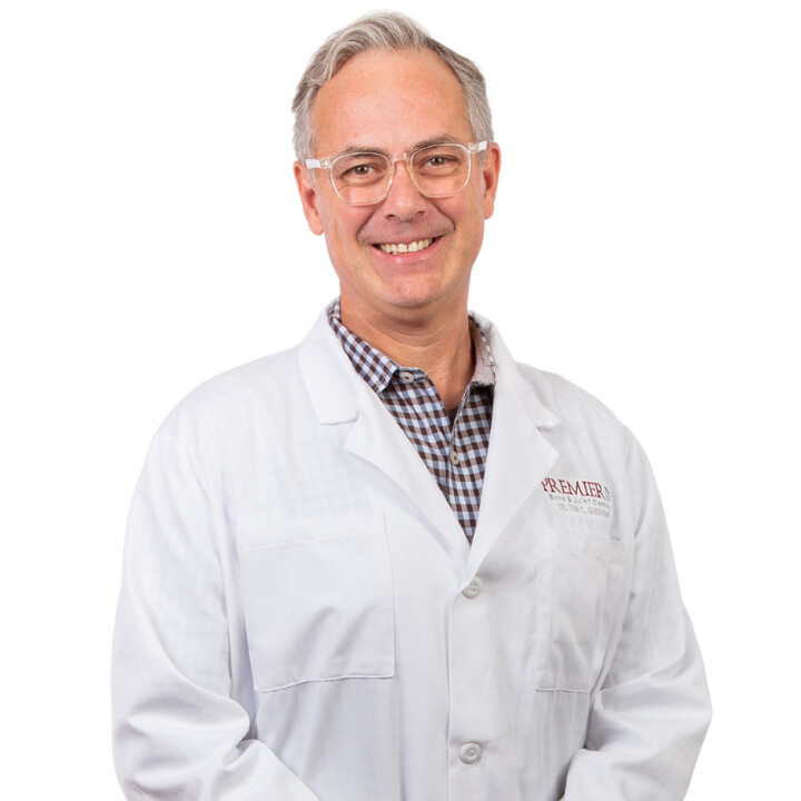 Tim C. Gueramy, M.D. Logo