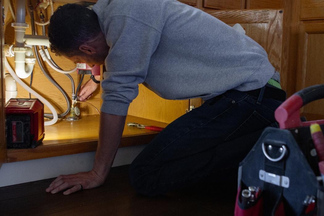 Images AquaMech Plumbing and Hydronics