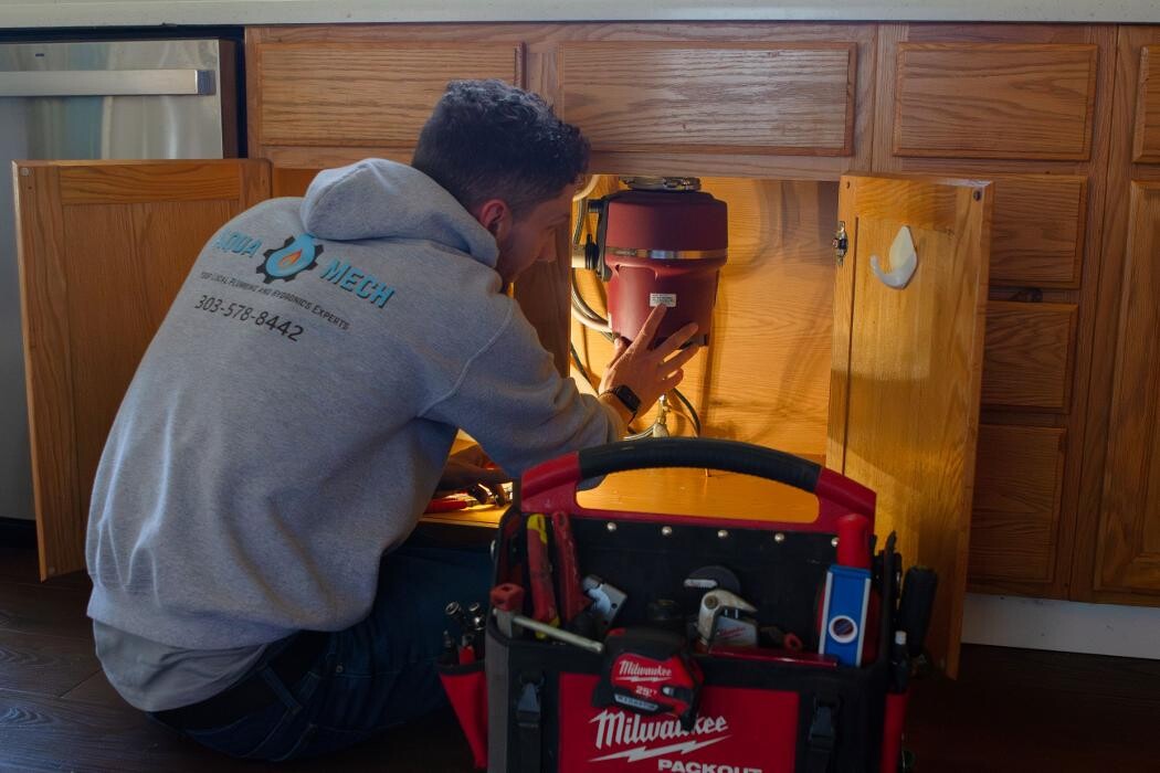 Images AquaMech Plumbing and Hydronics