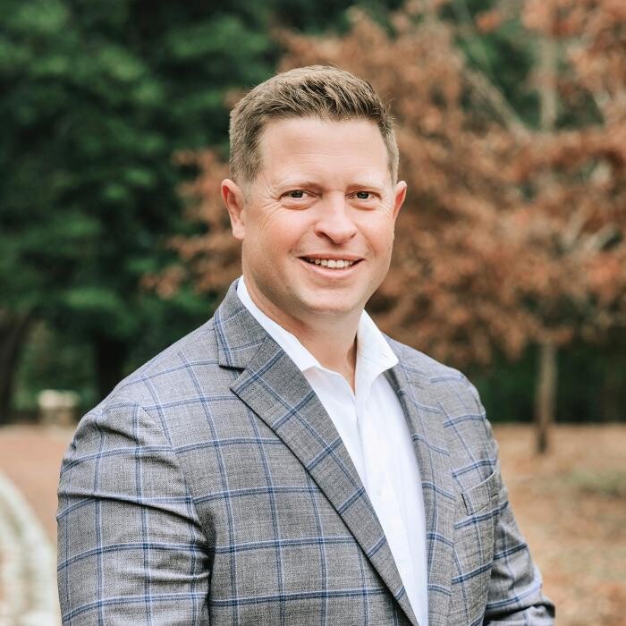 Taylor Flowers | Southern Trust Mortgage Logo