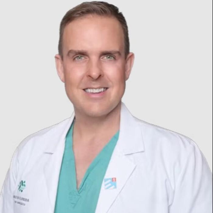 Travis Lewis, MD Logo
