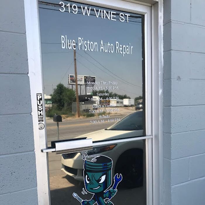 Blue Piston Auto Repair Logo