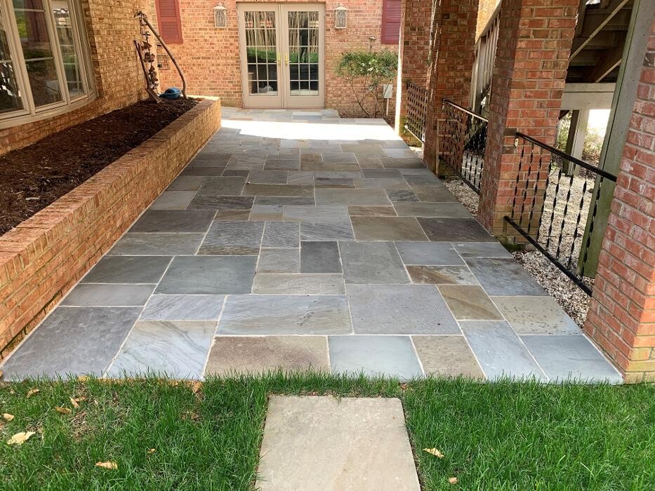 Images Custom Care Lawn & Property Services Inc