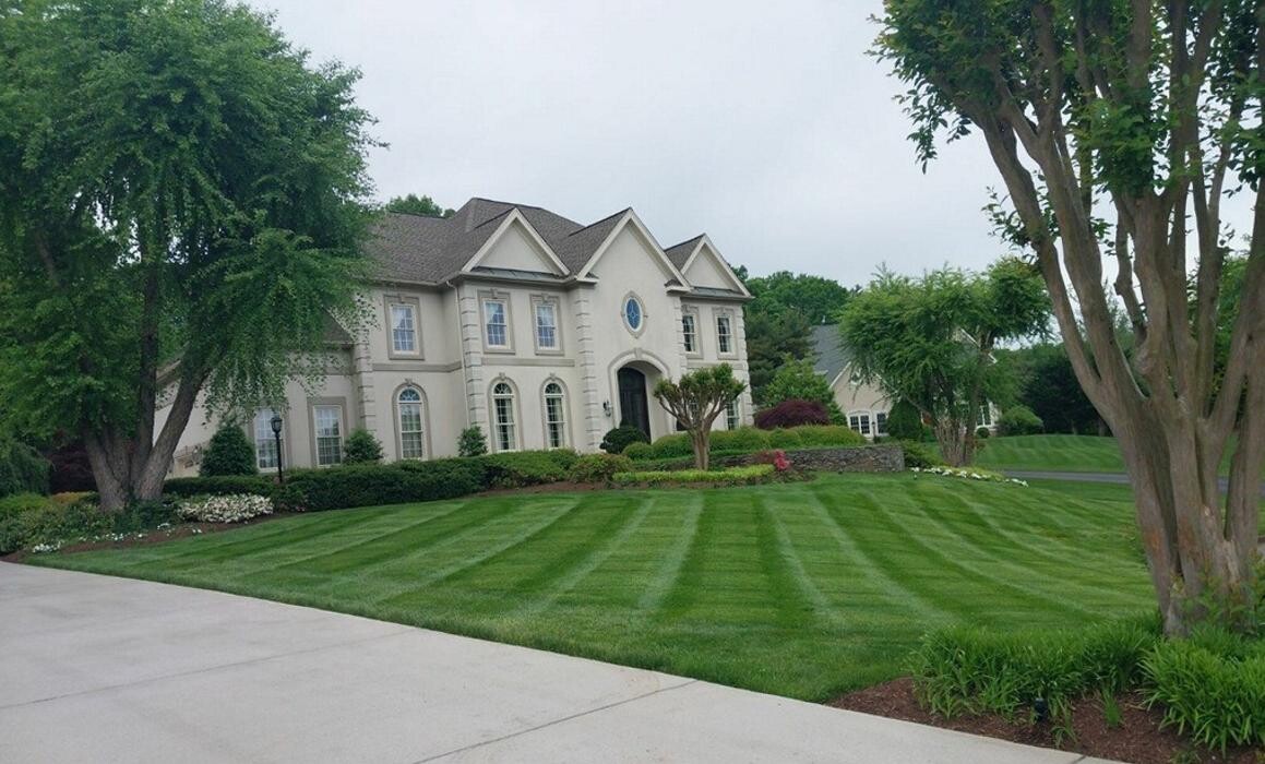 Images Custom Care Lawn & Property Services Inc