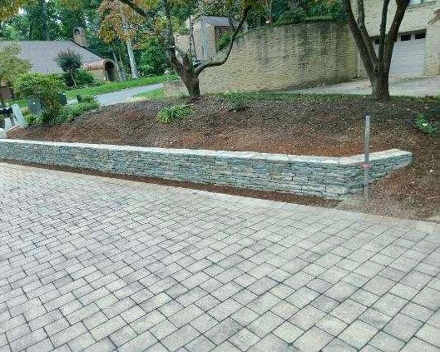 Images Custom Care Lawn & Property Services Inc