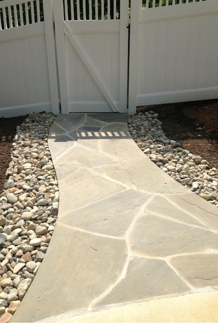 Images Custom Care Lawn & Property Services Inc