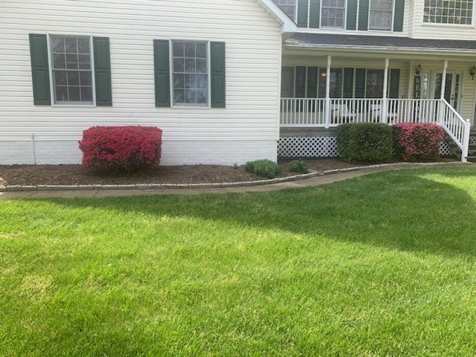 Images Custom Care Lawn & Property Services Inc