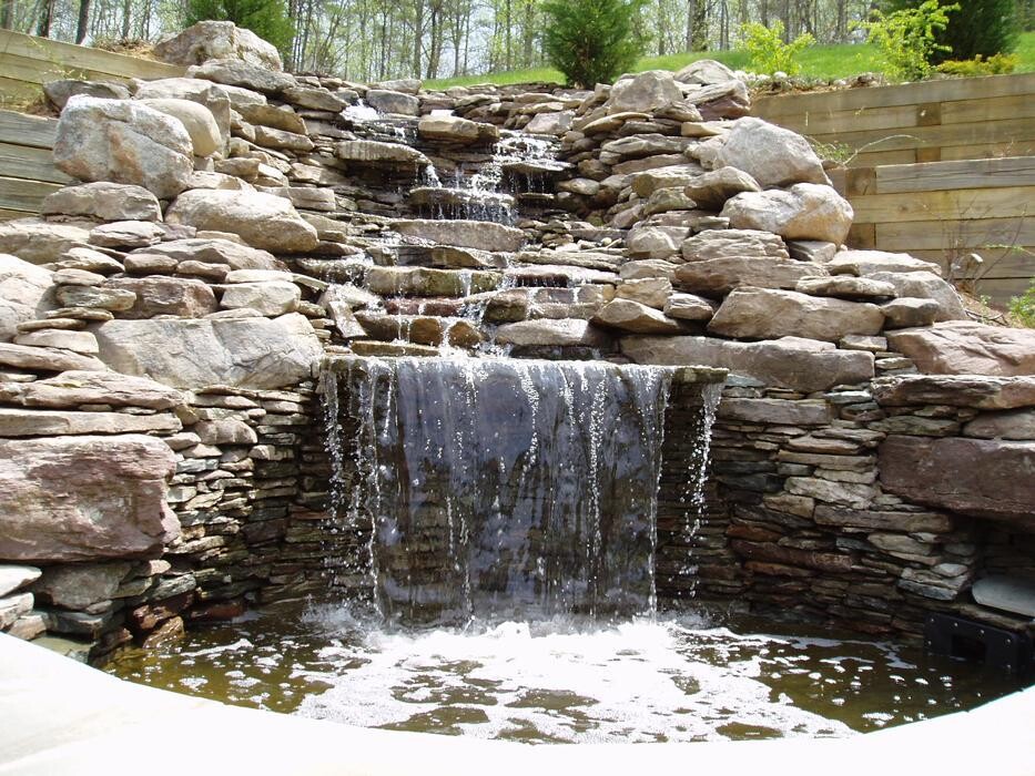 Images Custom Care Lawn & Property Services Inc