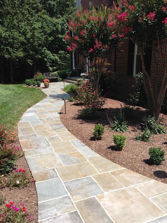Images Custom Care Lawn & Property Services Inc