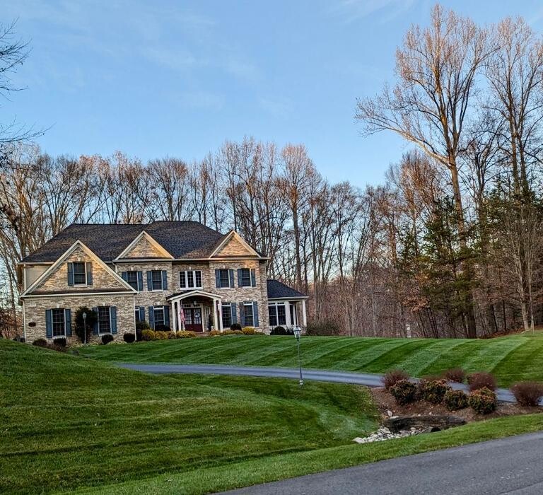 Images Custom Care Lawn & Property Services Inc