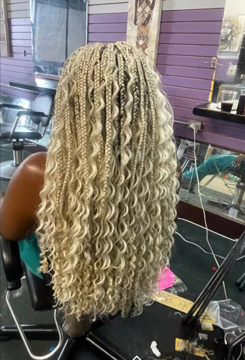 Nubian's African Hair Braiding Logo