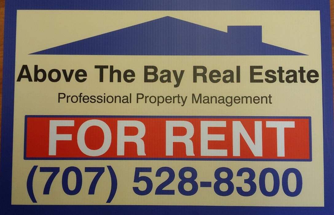 Above The Bay Real Estate Logo