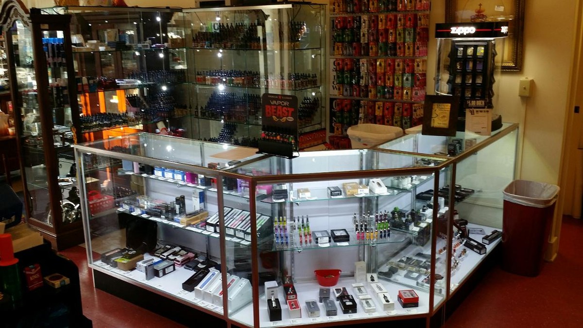 Images Fischer Antiques, Premium Cigars, and Vapes