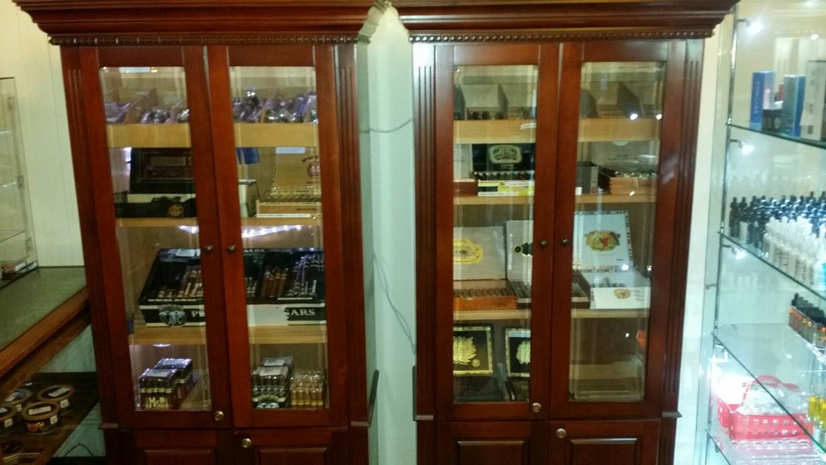 Images Fischer Antiques, Premium Cigars, and Vapes