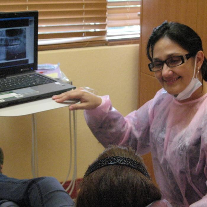 Images Dr. Dora R. Artiles: Art Dental Clinic.