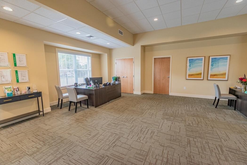 Images Woodland Plaza Apartments