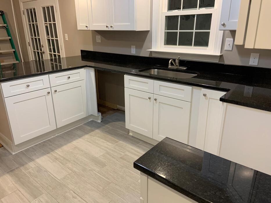 Images Quality Granite, Cabinets & Flooring