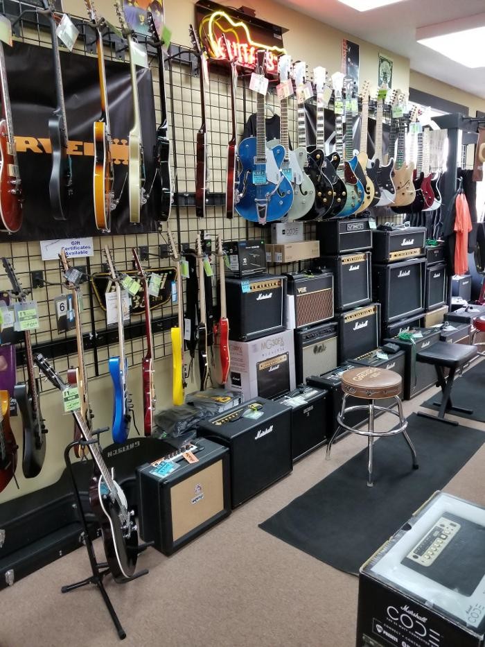 Images rEvolve Guitars & Music Shop