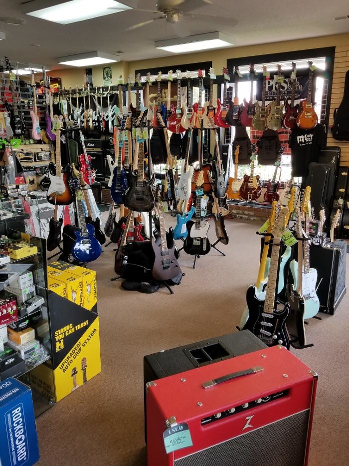 Images rEvolve Guitars & Music Shop