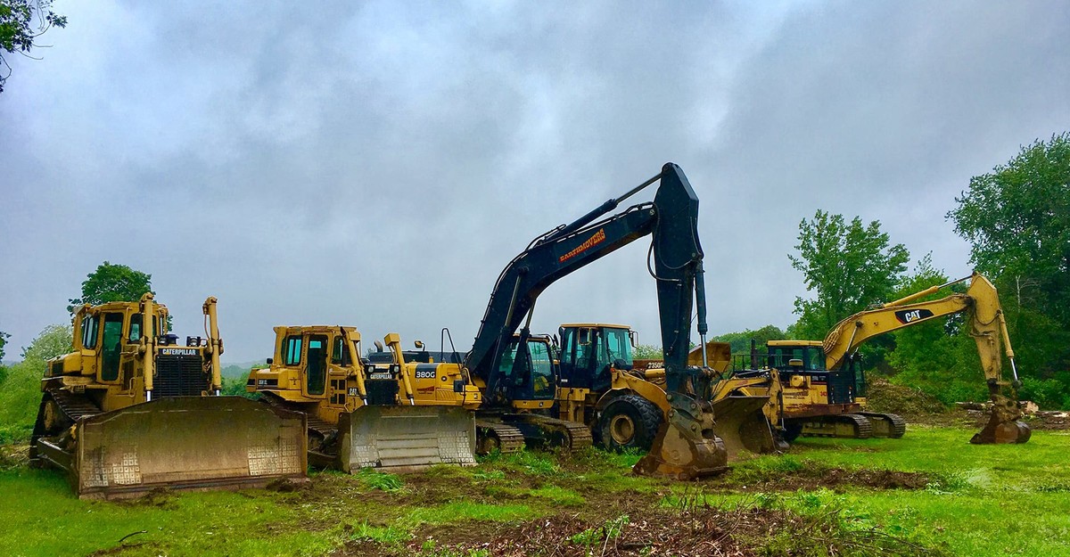 Images Earthmovers Yard