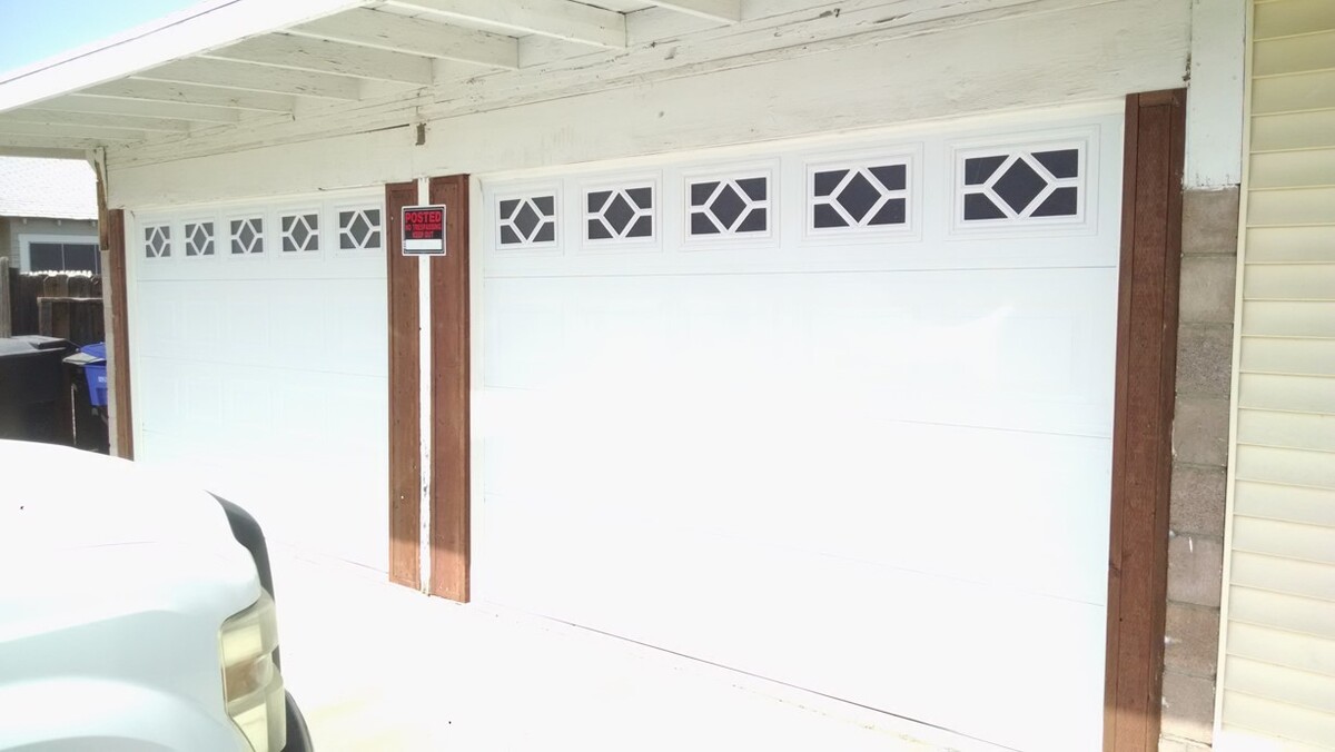 Images Garage Door Repair and Installations Company.