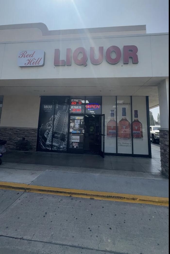 Images CoinFlip Bitcoin ATM - Red Hill Liquor (Orange)