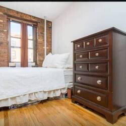 East Village Property Management Logo